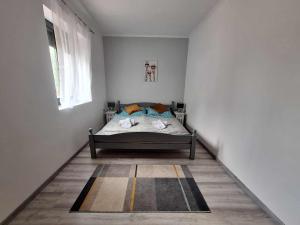 Postel nebo postele na pokoji v ubytování Appartamento Mattia