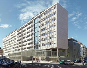 a large building with cars parked in a parking lot at Student Factory Strasbourg Etoile in Strasbourg