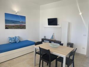 TV a/nebo společenská místnost v ubytování Agriturismo Le Paesane