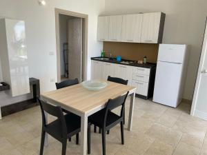 Kuchyň nebo kuchyňský kout v ubytování Agriturismo Le Paesane