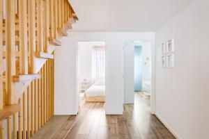 Ένα ή περισσότερα κρεβάτια σε δωμάτιο στο Green Tiles House