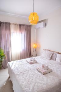 Postel nebo postele na pokoji v ubytování Bela Alexandra Guest House + 37 fotografií