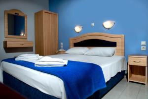 Posteľ alebo postele v izbe v ubytovaní Hôtel Argo