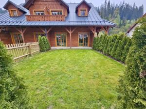 Zahrada ubytování Apartmán 8, Jezerné