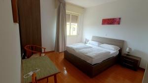 Postel nebo postele na pokoji v ubytování hotel Serena