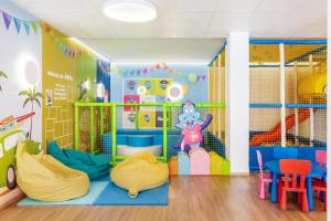 a childs play room with colorful walls at Best Club Vacaciones Pueblo Indalo in Mojácar