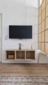 TV a/nebo společenská místnost v ubytování Cosy Apartment with a Magnificent View