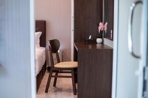 Postel nebo postele na pokoji v ubytování SeeView Resort (ซีวิว รีสอร์ต)