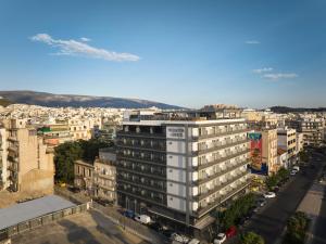 a view of a building in a city at Candia Hotel in Athens