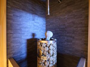 a pillar in a room with a brick wall at Dormy Inn Premium Shibuya-jingumae in Tokyo