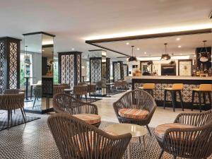 Ein Restaurant oder anderes Speiselokal in der Unterkunft Movenpick Resort & Spa Boracay 