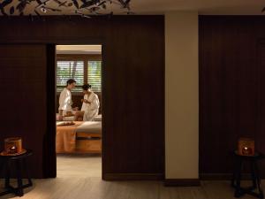 Ein Bett oder Betten in einem Zimmer der Unterkunft Movenpick Resort & Spa Boracay
