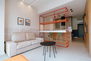 a living room with a couch and a table at Reliebe 44 in Las Palmas de Gran Canaria