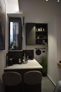 Photo de la galerie de l'établissement ΜΙΚΡΗ ΣΟΥΙΤΑ ΣΤΟ ΚΕΝΤΡο, à Patras