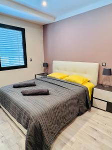 Postel nebo postele na pokoji v ubytování 4 Seasons Apartment