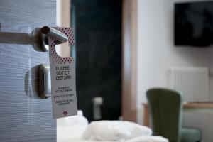 TV a/nebo společenská místnost v ubytování Dolomiten Hotel Irma