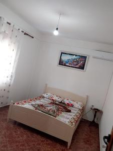 Postel nebo postele na pokoji v ubytování Besari Appartament's