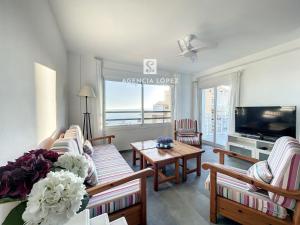 Et tv og/eller underholdning på Alo Sea View Apartment