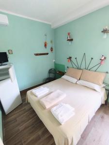 Postel nebo postele na pokoji v ubytování La Casa di Michele