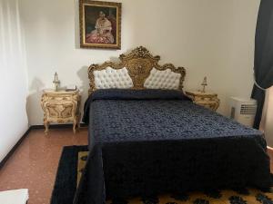 a bedroom with a bed and two night stands at Ranco Villa Lina in Ranco +16 photos