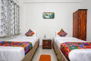 Postel nebo postele na pokoji v ubytování Hotel Comfort Caves