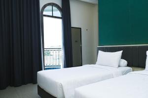 Photo de la galerie de l'établissement Kesuma Front One Boutique Palembang, à Palembang 40 autres photos