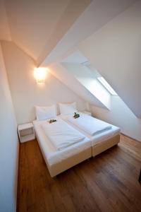 Postel nebo postele na pokoji v ubytování Apartment Nestroygasse