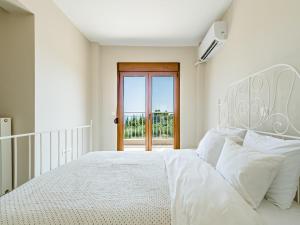 Posteľ alebo postele v izbe v ubytovaní Vacation house with a panoramic sea view and forest