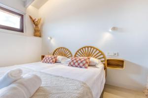 Postel nebo postele na pokoji v ubytování Finca Son Vidal