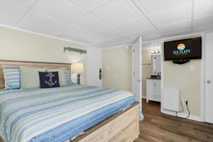 Voodi või voodid majutusasutuse The Waterway 406 by Sea Scape Properties toas