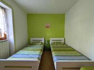 Postel nebo postele na pokoji v ubytování Apartment Luna