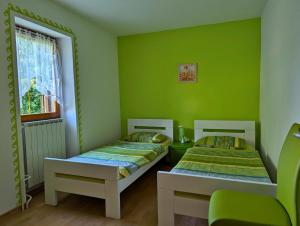 Postel nebo postele na pokoji v ubytování Apartment Luna