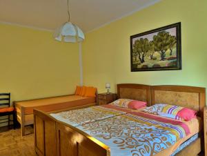 Postel nebo postele na pokoji v ubytování Apartment Luna