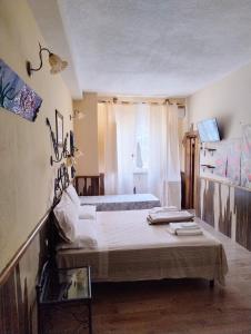 Postel nebo postele na pokoji v ubytování La Casa di Michele