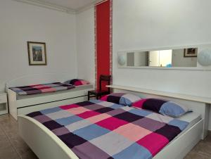 Postel nebo postele na pokoji v ubytování Apartment Luna