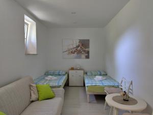 Postel nebo postele na pokoji v ubytování Apartment Luna