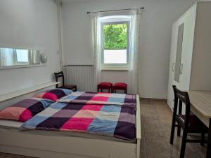 Postel nebo postele na pokoji v ubytování Apartment Luna
