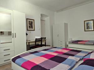 Postel nebo postele na pokoji v ubytování Apartment Luna