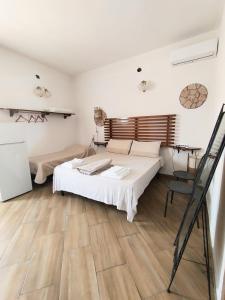 Postel nebo postele na pokoji v ubytování La Casa di Michele