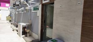 a building with a toilet on the side of it at Casa temporada Araçoiaba in Araçoiaba