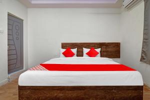 Ένα ή περισσότερα κρεβάτια σε δωμάτιο στο Hotel O R Square Bn Reddy