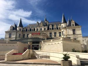 a large building with pointed towers on top of it at Spacieux studio Arcachon centre "5 nuits minimum" Parking gratuit in Arcachon