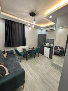 a living room with a couch and a table at The Square 30 in Istanbul