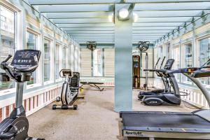 a gym with several treadmills and exercise bikes at Hilton Head Resort 1424 in Hilton Head Island
