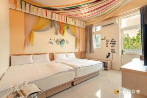 Voodi või voodid majutusasutuse Hong Lai Guest House toas
