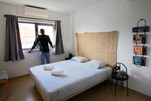 Cama ou camas em um quarto em WOT Lisbon Nomad