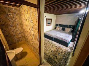 Postel nebo postele na pokoji v ubytování Riad Dar Fatihi Fes