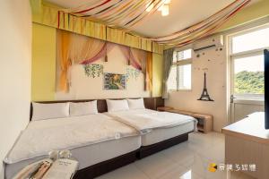 Voodi või voodid majutusasutuse Hong Lai Guest House toas