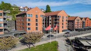 an aerial view of a city with buildings at Home Hotel Bryggeparken in Skien