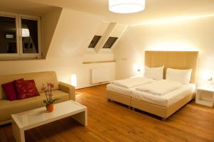 Postel nebo postele na pokoji v ubytování Apartment Nestroygasse